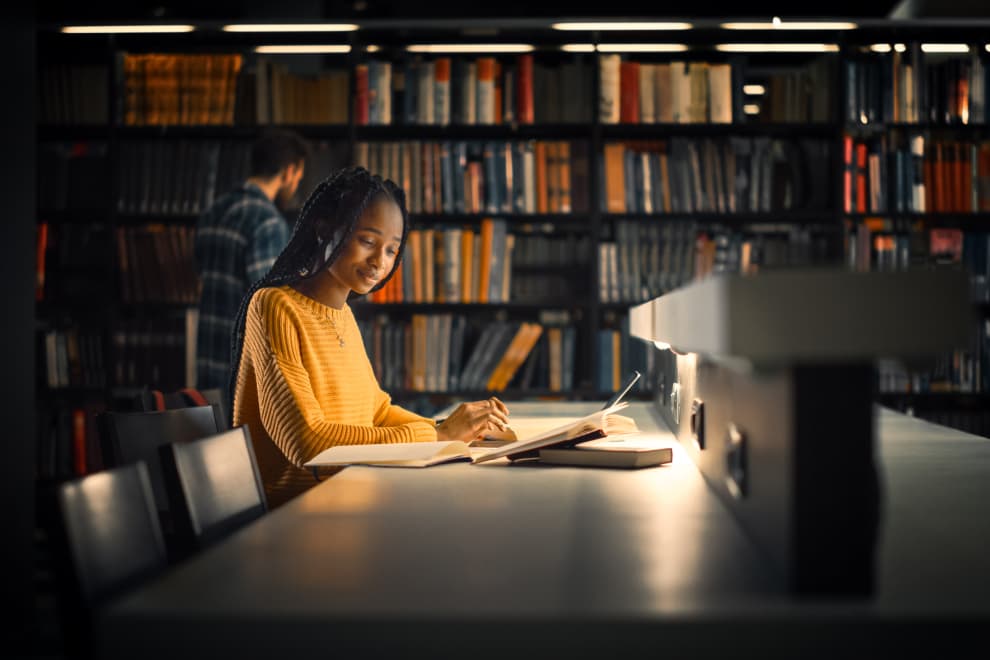 Woman studying at night. 